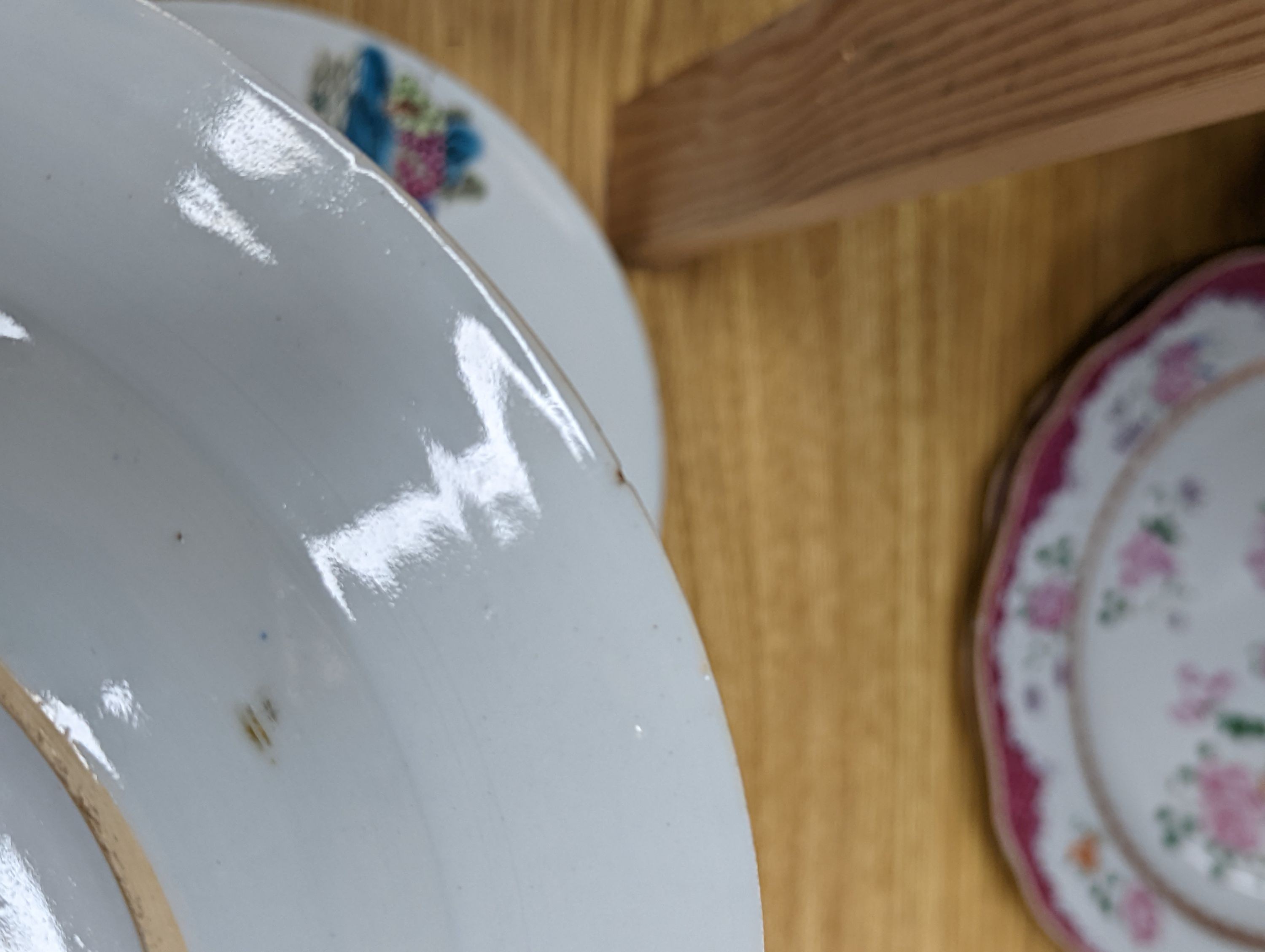 Two pairs of 18th century Chinese famille rose plates and an Imari plate, 26cm